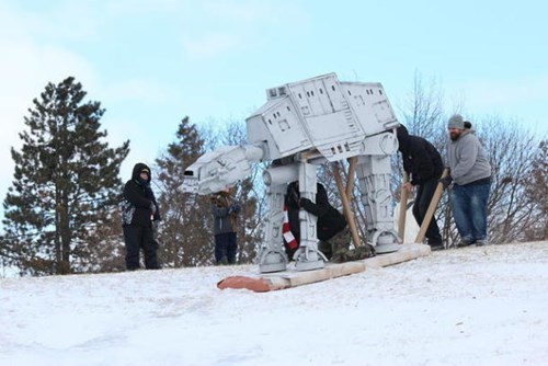 This Imperial sled was built by Drew Brewbaker, Garret Geiger and James Groves for the Lansing, Michigan 8th Annual Cardboard Classic. Competitors construct sleds out of nothing but cardboard, paint, glue, tape and paper and pray that it survives the snowy route. Unfortunately the AT-AT did not survive the trek. Check out this video to see a little bit of its journey.