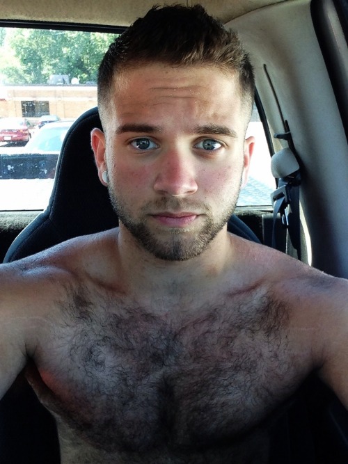 Say hello to Oliver and his new haircut. Very handsome guy. I especially like his eyes and hairy chest. Photo reminds me of the earlier Colt models from coltstudiogroup.com