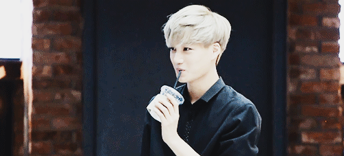 
16/∞ gifs of Jongin: Dying of laughter and almost spitting out his drink 
