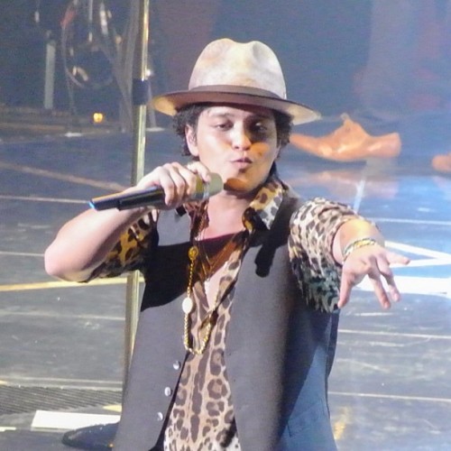 Bruno performing on stage in Austin (credit)