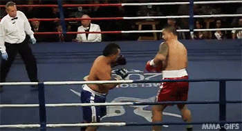 mma-gifs:

Craig Vitale’s knockout of Johny Kavanna with an uppercut from hell (21/08/2013)

What&#8217;s great about this uppercut is the way Vitale uses basic striking principles to land it.  Notice how an instant before he throws it, he steps sliiiiiightly to his right, and also leans his upper body to the right.  This moves him off of the center line of attack that his opponent is currently swinging wildly through.
Smultaneously, Vitale also throws his right uppercut from his right side while Kavanna [his opponent] is still charging forward without looking, his gloves fixed in front of him.  Because of this, Kavanna doesn&#8217;t even see the punch coming, and walks right into it.  Getting an opponent to walk into a punch always makes that punch land much harder, the same way a traffic accident will be more devastating with a head on collision than getting rear-ended.  It&#8217;s basic physics.
There&#8217;s some saying about excellence coming from being able to master the basics, and this moment definitely shows that.