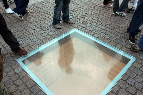 anotherlgbttumblr:

kp-ks:

Book Burning Memorial
'In the center of Bebelplatz, a glass window showing rows and rows of empty bookshelves. The memorial commemorates the night in 1933 when 20,000 “anti-German” books were burned here under the instigation of Goebbels. There's a plaque nearby that says something like “Where they burn books, they will also burn humans in the end.” '

Interesting but rarely mentioned: most of the content burned that night came from the Institut für Sexualwissenschaft (institute for the science of sex) headed by Magnus Hirschfeld. The institute and Hirshfeld himself were some of the first to openly campaign for the right to have sex with someone of the same gender, the right to transition if you did not identify with your birth sex and for the general acceptance of queer people. The team had already performed the first SRS operations in Germany and in addition, the institute advocated sex education, contraception, the treatment of sexually transmitted diseases, and women’s emancipation. Photographs of the night of the book burning are plastered across history books world wide, but the queer movement that was destroyed that night often goes unmentioned.
