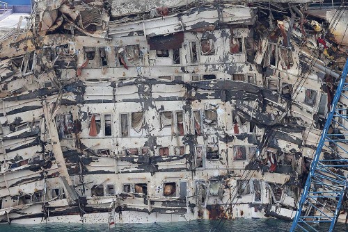 A detail of the previously submerged side of the Costa Concordia.