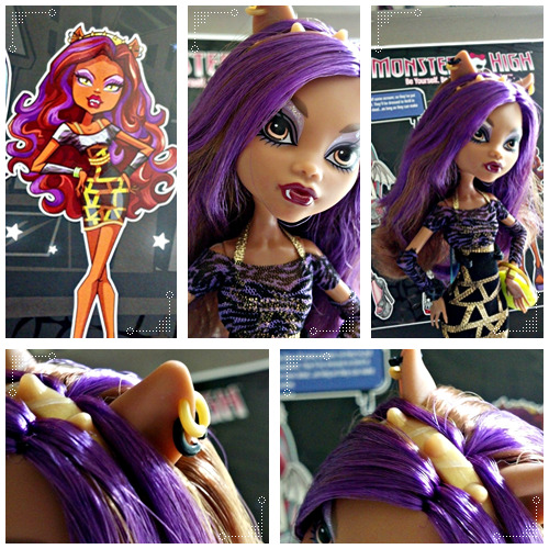 monster-everafter-high-girls:

GNO Clawdeen has soft dull purple eyeshadow with glitter, and dark maroon lips. She has gold and black earrings as well as a spiked headband. Her hair is the color of her 13 Wishes version with added purple streaks. The hair needed powder right away and is a bit thin.
