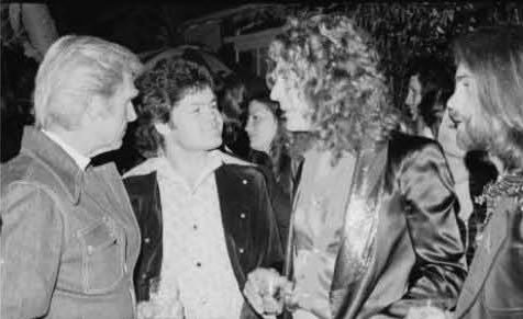 A rare photo of Micky Dolenz and Robert Plant from the Swan Song launch party in Los Angeles, 1974