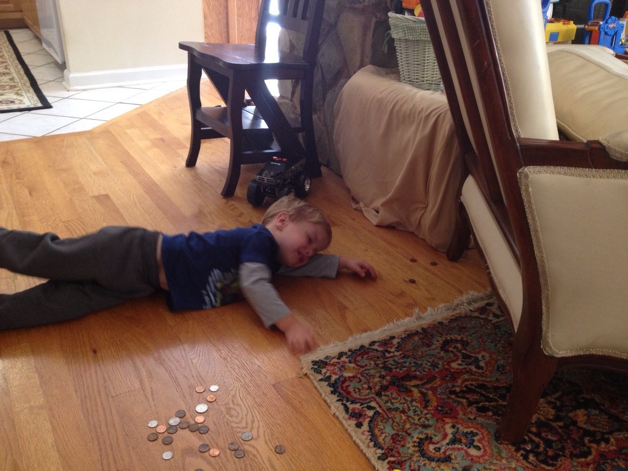 "He can’t reach the pennies. They’re too far away."Submitted By: Whitney L.Location: Kentucky, United States 