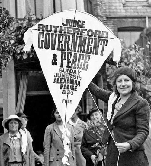jw-archives:    UK-North London-Alexandra Palace (1930's??)  Using a Kite to proclaim the word.  Now we are making preaching more fun. ;-)  Anyone tried this lately? Just curious.  How about a huge parasail announcing the Memorial on the beaches? That would be fun + preaching all at once.  Jehovah commanded us . 