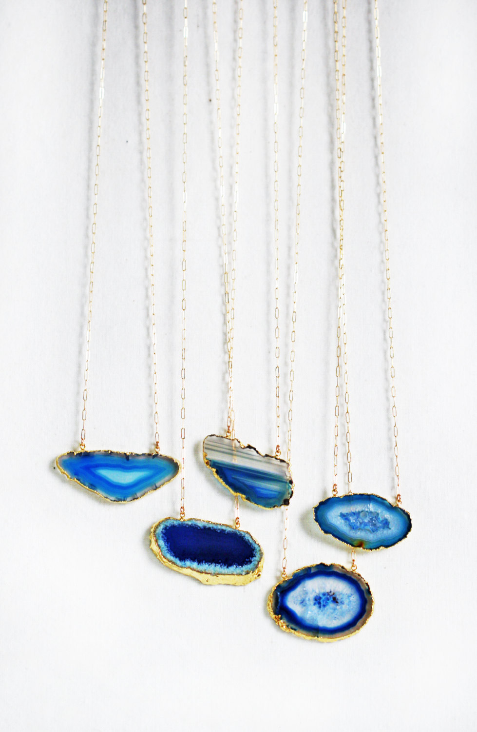 etsyfindoftheday:

etsy find of the day 1 | 12.22.13
blue ‘zoni’ necklace by keijewelry
a blue christmas is far from sad if you celebrate it with one of these stunning blue agate geode necklaces. perfect for gifting!
