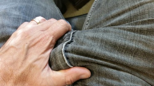 A favorite son sent me a message this morning while at work that got me so fucking excited and horny and HARD when I read it. That kept me behind the desk for awhile due to the huge bulge in my jeans.  He said he would like to have had a picture of that! And my reply was that might be possible because it would probably happen again soon LOL…. Okay now… here I am at my desk in similar situation again so get ready for the pics… hehehe…..