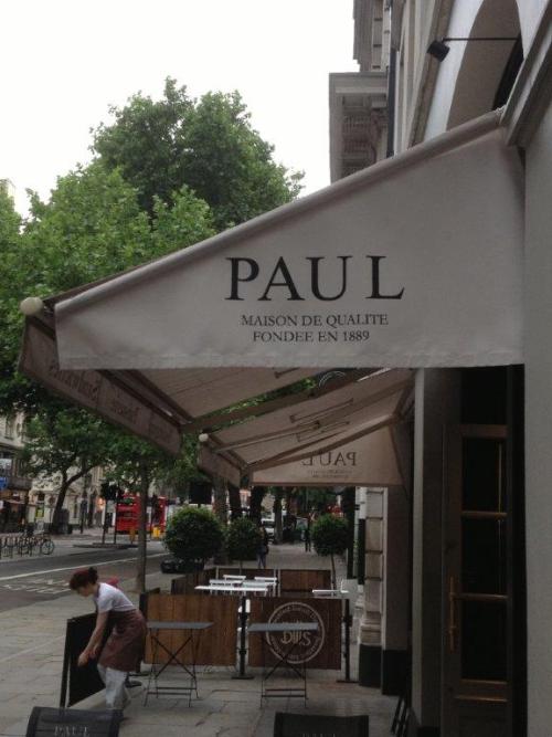 Foldaway awning with small side blinds at Paul in Kingsway, London. 