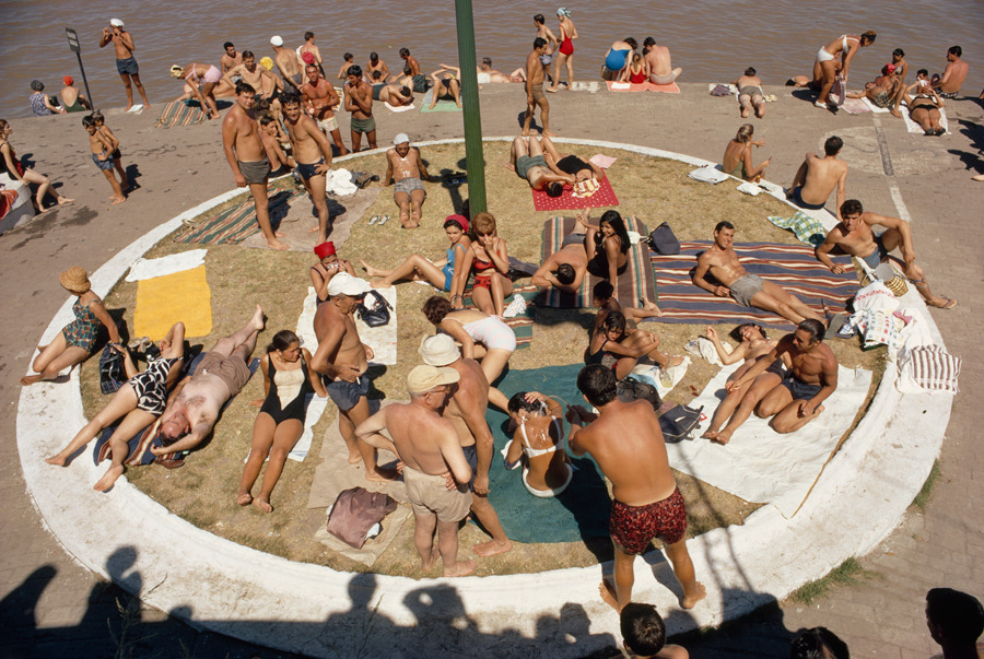 People in Buenos Aires, Argentina, flock to municipal riverside beaches to relax in the sun, November 1967.Photograph by Winfield Parks, National Geographic