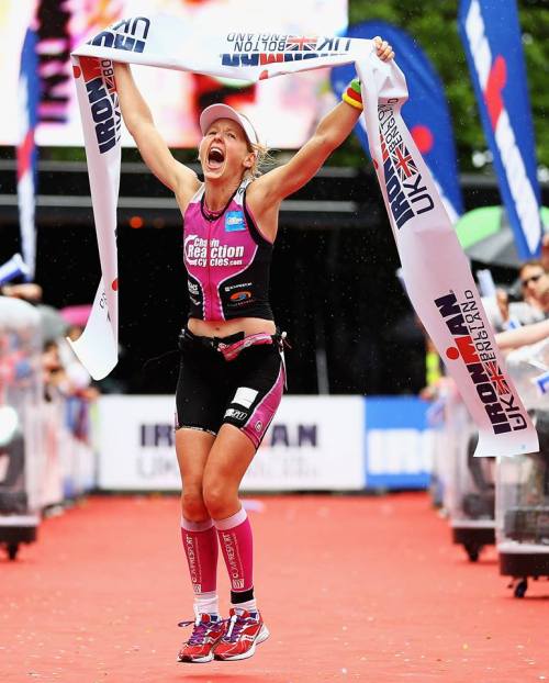 Athlete Lucy Gossage celebrates the winning of the Ironman UK competiton.