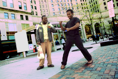 BEATS &#8212; Drifter and vocal percussionist Ottis Clark (left) beatboxes while City Mission resident Arron Griggs dances at Public Square in downtown Cleveland on April 18, 2012. Clark, who stopped in Cleveland during his cross-country trip from Oregon to Vermont, performed his brand of Haitian-Creole beats for passers-by. &#8220;They love it in American when you are homeless and become famous,&#8221; Clark said. &#8220;I can&#8217;t complain about that.&#8221; Photo by Brandon Blackwell @CapturedCLE 