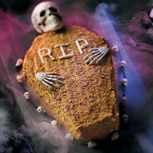 catacombsofptolemais:  Pumpkin Coffin Cake Ingredients 3/4 cup butter, softened 1-1/2 cups sugar 3 eggs 1-1/2 cups canned pumpkin 1-1/2 teaspoons vanilla extract 3 cups all-purpose flour 1-1/2 teaspoons ground cinnamon 1 teaspoon baking powder 1 teaspoon baking soda 3/4 teaspoon ground nutmeg 1/2 teaspoon salt 1/4 teaspoon ground ginger 1/4 teaspoon ground cloves 1 cup buttermilk FROSTING/FILLING: 2 packages (8 ounces each) cream cheese, softened 1/2 cup butter, softened 3-1/2 cups confectioners’ sugar 2 to 3 teaspoons maple flavoring 1/2 cup heavy whipping cream 2 cups crushed gingersnap cookies (about 40 cookies) Directions In a large bowl, cream butter and sugar until light and fluffy. Add eggs, _ne at a time, beating well after each addition. Beat in pumpkin and vanilla. Combine the flour, cinnamon, baking powder, baking soda, nutmeg, salt, ginger and cloves; add to pumpkin mixture alternately with buttermilk, beating well after each addition.   Line a greased 13-in. x 9-in. baking pan with waxed paper and grease the paper; spread batter into pan. Bake at 325° for 40-45 minutes or until a toothpick inserted near the center comes out clean. Cool for 5 minutes before removing from pan to a wire rack to cool completely.   In a large bowl, beat cream cheese and butter until smooth. Add confectioners’ sugar and enough maple flavoring to achieve a spreading consistency. For filling, in a small bowl, beat 1 cup frosting with whipping cream until soft peaks form.   Cut cake into a coffin shape (discard scraps or save for another use). Cut cake horizontally into two layers. Place bottom layer _n a serving plate; spread with filling. Top with second layer.   Set aside 2 tablespoons frosting for writing; frost cake with remaining frosting. Sprinkle with cookie crumbs. Cut a small hole in the corner of a plastic bag; fill with reserved frosting. Pipe “RIP” _nto cake. Store in the refrigerator. Yield: 20 servings. Originally published as Coffin Pumpkin Cake in  Halloween Party Favorites , p30     
