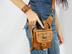 whitfit:  begentlewithmewatson:  satdeshret:  warriorcreek:  The Warrior Pack purse line. There are 8 different ways you can wear the purse (handbag, purse, thigh holster, shoulder holster, messenger bag, backpack, fanny pack, and protected purse). Simply