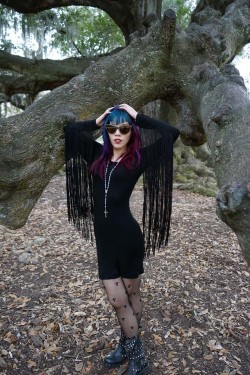 lacarmina:  Witchy woman in New Orleans: Killstar bodycon Gothic fashion (by La Carmina - LaCarmina.com)Goth model and style blogger La Carmina wears Killstar fringe-sleeve dress in New Orleans, Louisiana. More of this shoot, and her guide to NOLA voodoo,