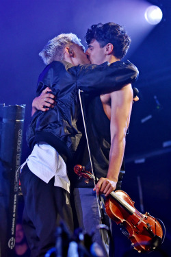 joshuamassive:  yearshq:  Olly Alexander of Years &amp; Years kisses boyfriend Neil Amin-Smith of Clean Bandit as they perform on the main stage at the 2015 Jersey Live Festival at Saint Helier on September 05, 2015 in Jersey, Channel Islands  Neil looks