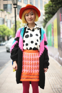 wgsn: Loving the eclectic colour and pattern clashing in this street shot from Shanghai Fashion Week. 