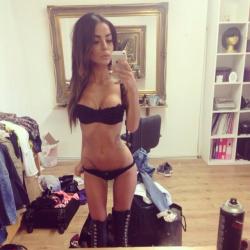 perverse sexy brunette selfshot skinny fit body and her big fake tits