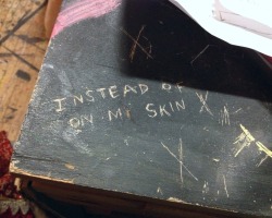 frekle-d:  posssibly:  Someone carved this into a table backstage. I don’t know who it was but to think that I may have encountered them at one point or even just read their name somewhere on a wall is amazing.  omg 