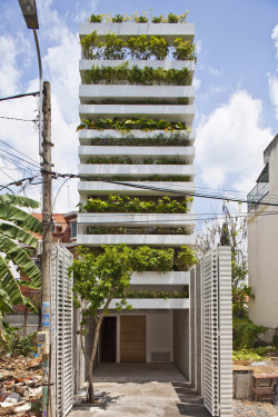 internalisecarlo:  Eco time: Vo Trong Nghia Architects designed this house with a vertical garden as facade in Ho Chi Minh City. The front and the back of the building consist of concrete planters. Additionally, the facade helps to regulate sunlight,