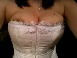 kallisti88 has some amazing cleavage in this busty white corset.