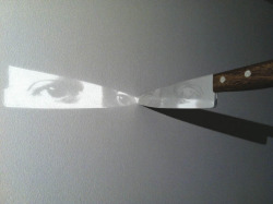 7while23: Graciela Sacco, Untitled (Admissible Tension), 1996/2011 (Light installation, print on mirror, knife and light)