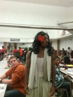 malkatz:  maidotsuki:  WE HAD THIS DISNEY DAY FOR SPIRIT WEEK AND THIS GUY WHO I HAVE SEVERAL CLASSES WITH WHO ALWAYS SEEMS TO COOL FOR SHIT DRESSED IN FULL DRAG AS TIANA  the guy behind him is looking at him lovingly 