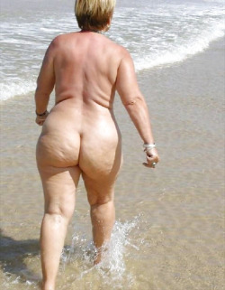 fat-naked-old-grannies:  Beach granny with flabby ass walks the beach in search of her hard young loverboy!Find YOUR Sexy Senior Lover Here