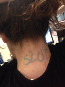 highlandwhore:  Got bored at work so decided to have some fun with the stationery. Gave a presentation to a room full of men with this written on the back of my neck. If only theyâ€™d knownâ€¦ ;)  &ldquo;Slut&rdquo;