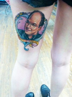 fuckyeahtattoos:  George Costanza done by Caroline Westmeyer at Blue Rose Tattoo in Huntsville, Alabama, USA.  Growing up my brother watched Seinfeld like it was a religion and now as an older fella he reminds me of George. Look what it did bro, look