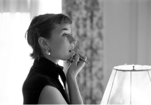 rareaudreyhepburn:Audrey Hepburn photographed by Lawrence Fried in her hotel room in Manhattan, in preparation for her stage role in the theatre play ‘Gigi’ at the Fulton Theatre, New York City, December 1951. @iconicimagesnet