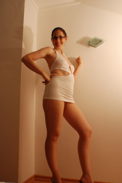 slutsabine:  Dressed, teasing with my legs  Stunningly sexy xxxx
