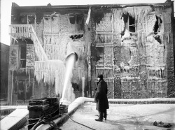 Frozen fire-fighter water on a burnt building, New York, 1920&rsquo;s.