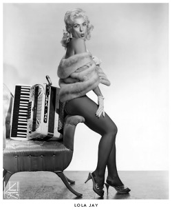 Lola JayA unique performer who apart from being an exotic dancer, was also an  accomplished musician and singer.. Later on, she’d leave the accordion  behind and dance under the name: “Polly Anne”..