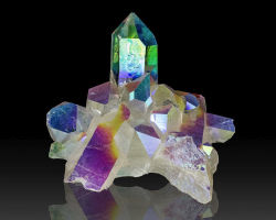bijoux-et-mineraux:Opal Aura Quartz - Arkansas The unique colors come from a thin layer of platinum, which is molecularly bonded to the quartz 