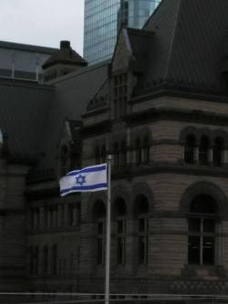 girlactionfigure:  *TORONTO RAISES ISRAELI FLAG OVER CITY HALL*In a show of solidarity with Israel and in celebration of its 67th Independence Day, the Toronto City Hall raised the Israeli flag at 10 a.m. this morning in a ceremony led by City Councilor