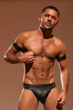Leather guy tweaks his hardwired nipples.  For more gay nippleplay, visit Nipple Pigs