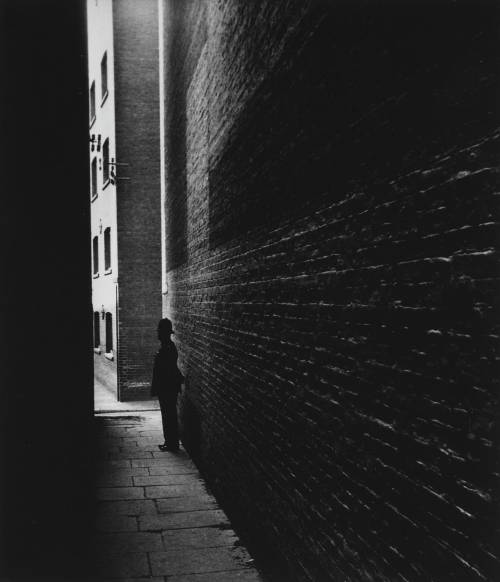 Bill Brandt - Policeman in a Dockland Alley, Bermondsey, 1934. Nudes &amp; Noises  
