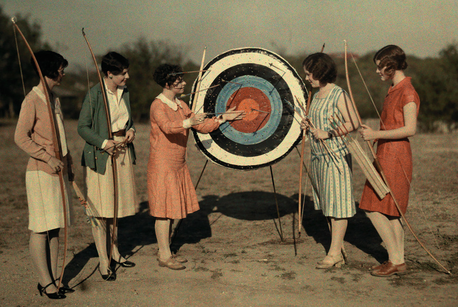 Women attend an archery class at the University of Texas, March 1928.Photograph by Clifton R. Adams, National Geographic