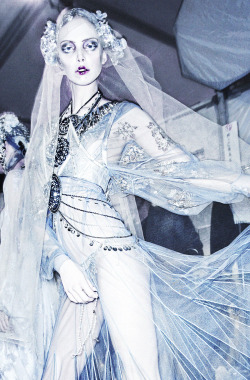 deprincessed:  Fashion’s own fairy Tanya Dziahileva twirls backstage for the cameras with silver flower gilded hair, icy makeup courtesy of industry icon Pat McGrath, and a sheer faded pearly blue gown with iridescent sequin details and metallic coin