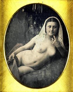chubachus:  Daguerreotype portrait of a nude woman, c. 1850. Attributed to Bruno Braquehais.