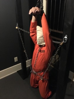 malebondagepigs: seabondagesadist: The prisoner came to visit for some heavy bondage and captivity. After processing he found himself in orange, tape gagged, muzzled, shackled, mittens, chained and strapped in heavy bondage for several hours… Looks