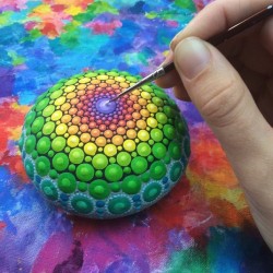 moonblossom: the-awesome-quotes:  Artist Paints Ocean Stones With Thousands Of Tiny Dots To Create Colorful Mandalas.  The artist’s name is Elspeth McLean, and here is her Etsy store. I’d love one of her stones, but they disappear almost as soon as