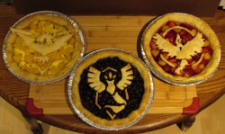 captnmcd:    Well I was wanting a cut of this pokemon GO pie but my phone is incapable of using the internet and I usually call it a potato, so I made my OWN POKE PIE! we got Blueberry as Team Mystic, Strawberry Peach as Team Valor, Peach Mango as Team