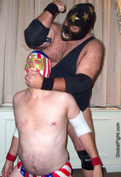 wrestlerswrestlingphotos:  powerlifting pro wrestler hairyman beating up captain america