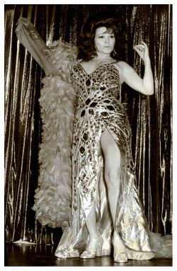 Blaze Starr     (aka. Fannie Belle Fleming) Vintage press photo from June 6 of 1975 features Blaze posing on stage at the ‘PALACE Theatre’; located in the Tenderloin district of San Francisco.. A press conference followed with an announcement