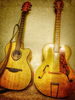 guitar-porn:  Timeless. &ldquo;The one on the left is a French LAG, I named her Alice. Bought it brand new a few months ago (although I’m unsure on the actual build date) the one on the right is my grandmothers 1948 KAY acoustic guitar named Darlene