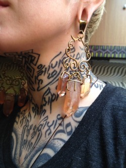 namesofthedead:I just got these stunning quartz and brass ear weights in the mail. They were made by http://pinstripedbutton.tumblr.com - Rebecka does beautiful work and I can’t recommend her highly enough. Go follow her and commission something for