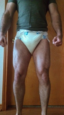 alittleisolated:Flexed  Such a fucking HOT diapered man